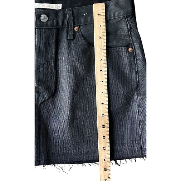 Levi’s Icon Button Fly Raw Hem Coated Denim Black Mini Skirt 29X14 - Picture 3 of 8